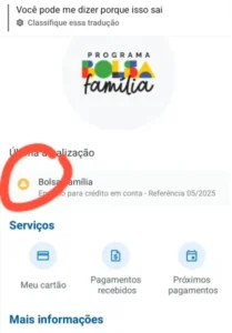 Ícone amarelo de alerta no aplicativo Bolsa Família indicando o envio para crédito em conta