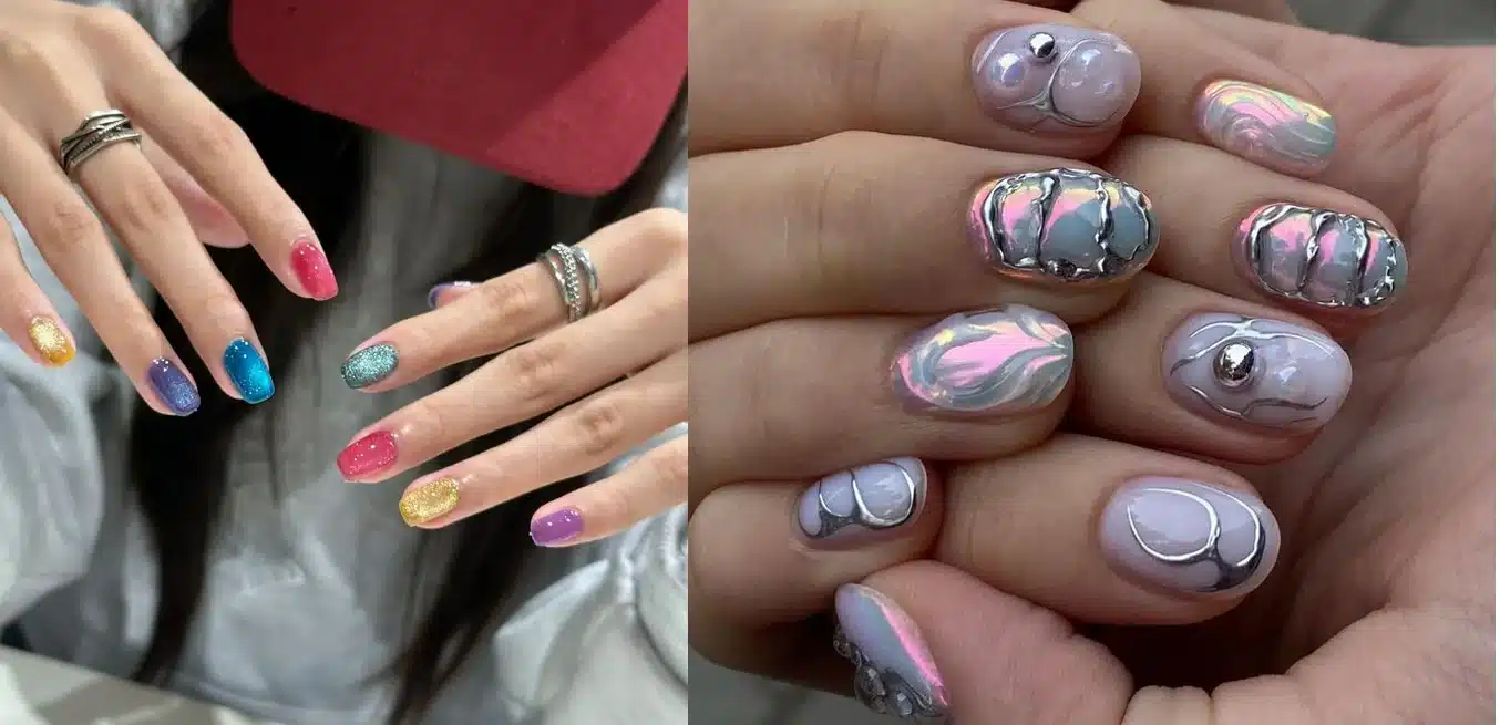 Unhas decoradas coreanas com brilho e elementos metálicos modernos.