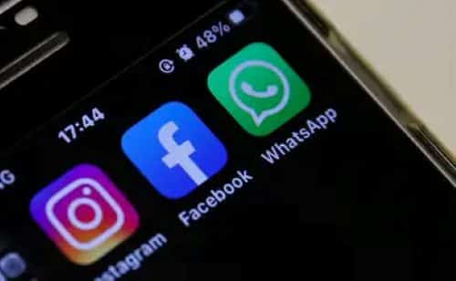 Ícones do Instagram, Facebook e WhatsApp em tela de celular, com foco na funcionalidade de novos anúncios no WhatsApp.