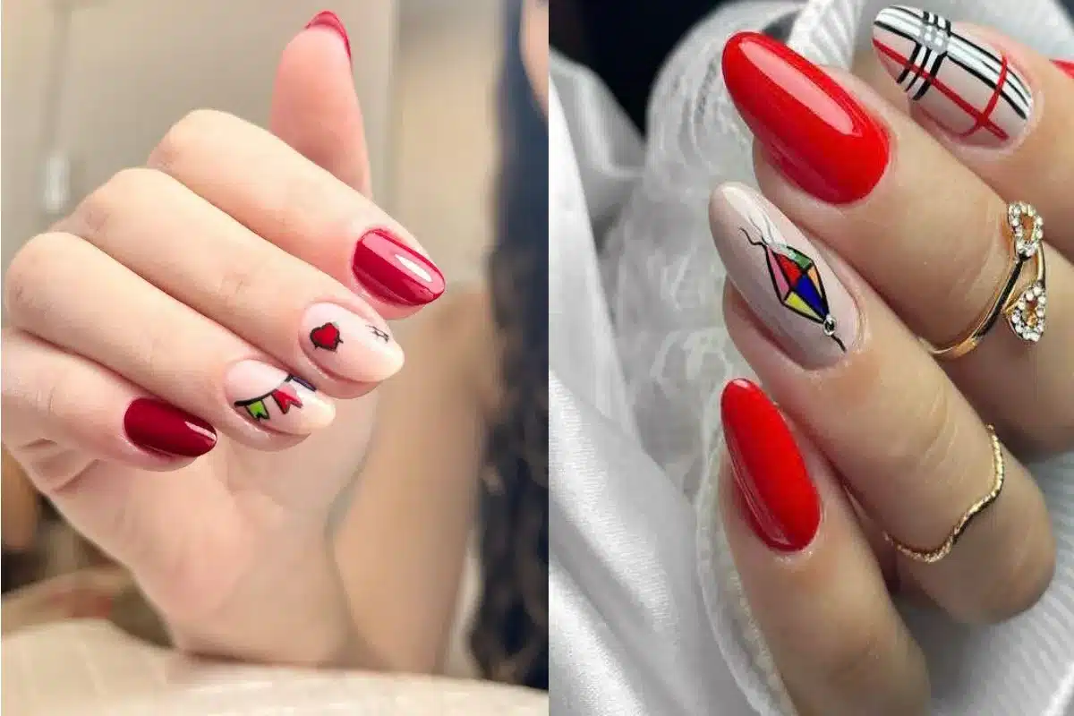 Unhas decoradas com esmalte vermelho, bandeirinhas e desenho de pipa para festa junina.