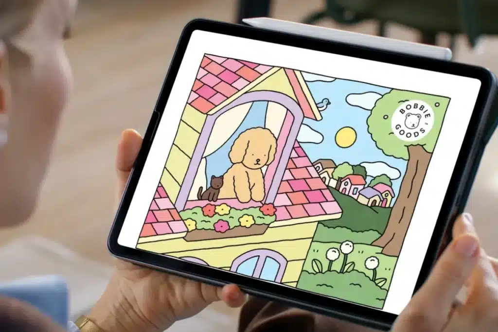 Desenho colorido de um cachorro e um gatinho na janela de uma casa, com cenário ao fundo.