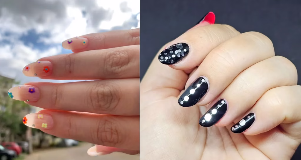 Unha decorada com flores coloridas e esmalte preto fosco com bolinhas brilhantes