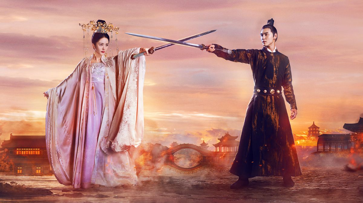 Yang Mi e Ethan Juan, protagonistas do dorama "A Lenda de Fuyao", lutando com espadas em uma cena de fantasia.
