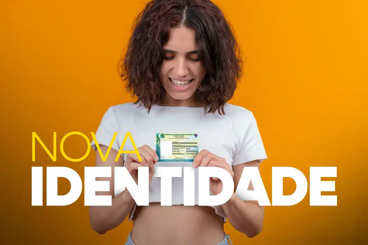 Mulher segurando nova Carteira de Identidade brasileira, em destaque sobre fundo amarelo, ilustrando a diferença entre RG e CIN.