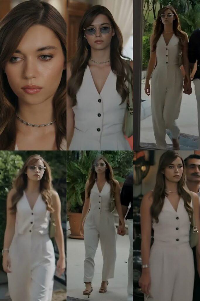 Colagem da atriz Afra Saraçoğlu como a personagem Seyran na série turca Yalı Çapkını, vestindo um elegante macacão branco com botões pretos.