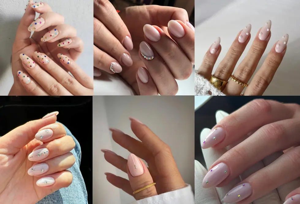 Unhas decoradas com pedrarias coloridas e detalhes delicados para inspiração.