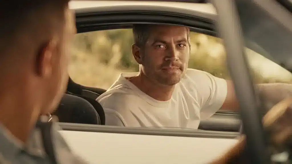 Paul Walker, como Brian O'Conner, em uma das cenas mais emocionantes de Velozes e Furiosos.