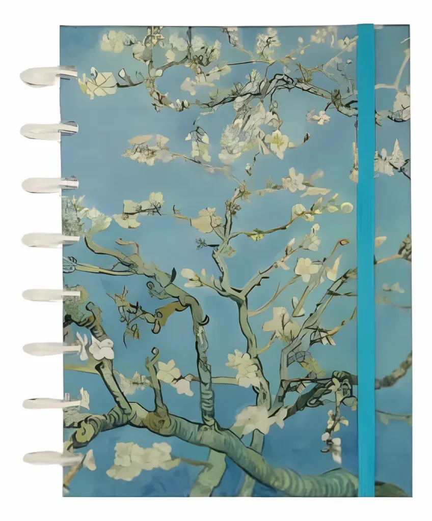 Planner Argolado Buendía com capa ilustrada de flores e fundo azul.