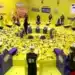 Participantes do BBB26 enfrentam prova de resistência com bolas amarelas em um cenário amarelo e roxo.