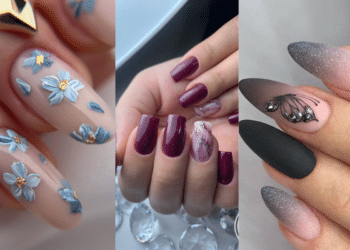 Composição de três estilos de unhas sofisticadas para o outono: nail art floral azul em relevo, esmalte berry com efeito marmorizado e unhas degradê preto e cinza com desenho de borboleta.